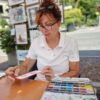 Paola Merlin mentre dipinge 2